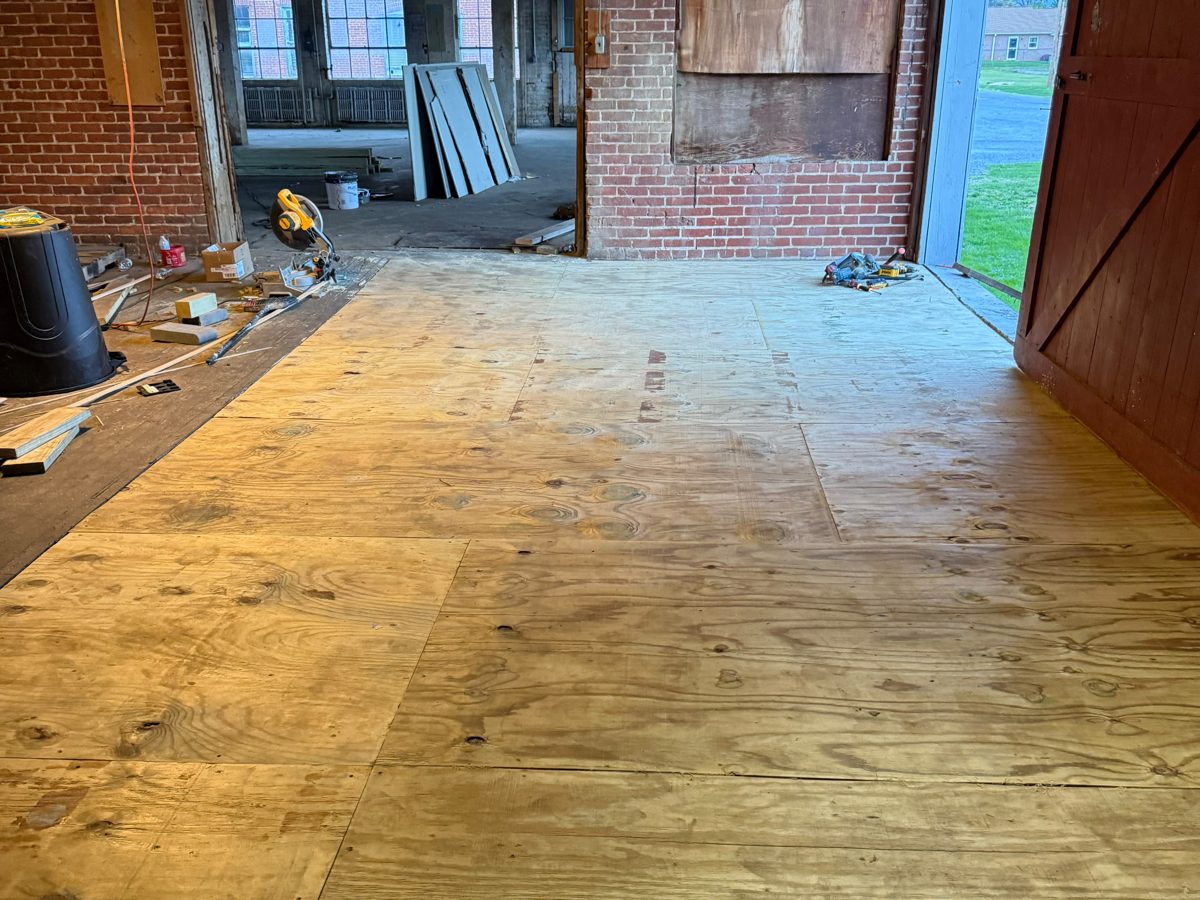 The same space with a new plywood subfloor screwed down over the sleepers